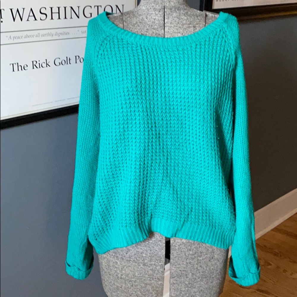 Green crew neck sweater